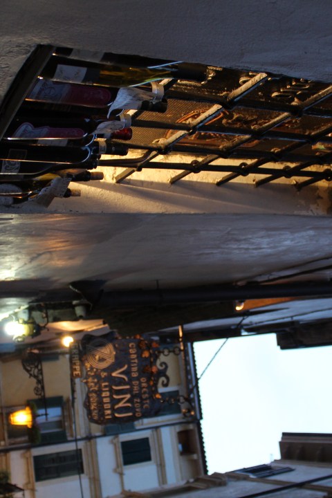 A window with wine bottles