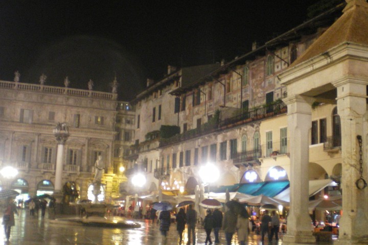 A square in the night in Verona