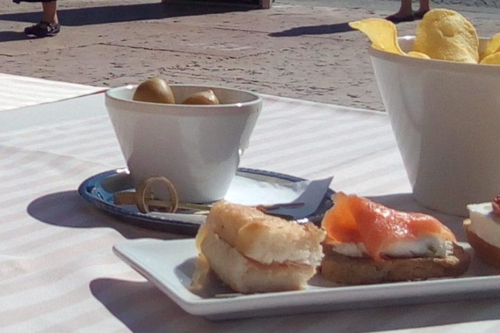 a plate of food and a cup of coffee